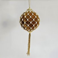 Золотой шар с жемчужинами и кисточкой